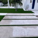 Shell Broadcast Concrete with Grass Chases & Marble